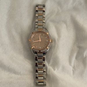 Bulova rose gold and stainless water resistant beautiful ladies watch
